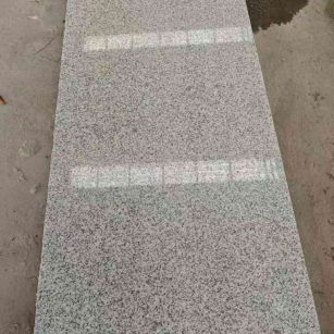 晋城芝麻白光面毛板